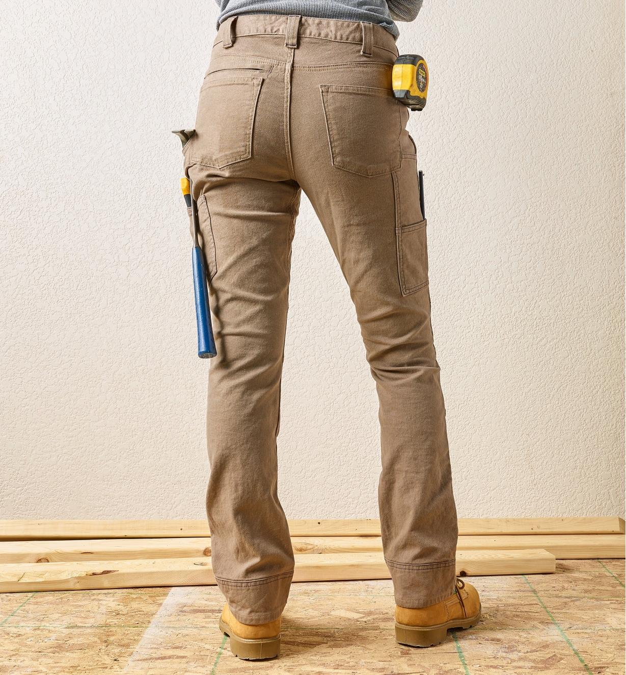 Back view of a woman wearing Dovetail work pants