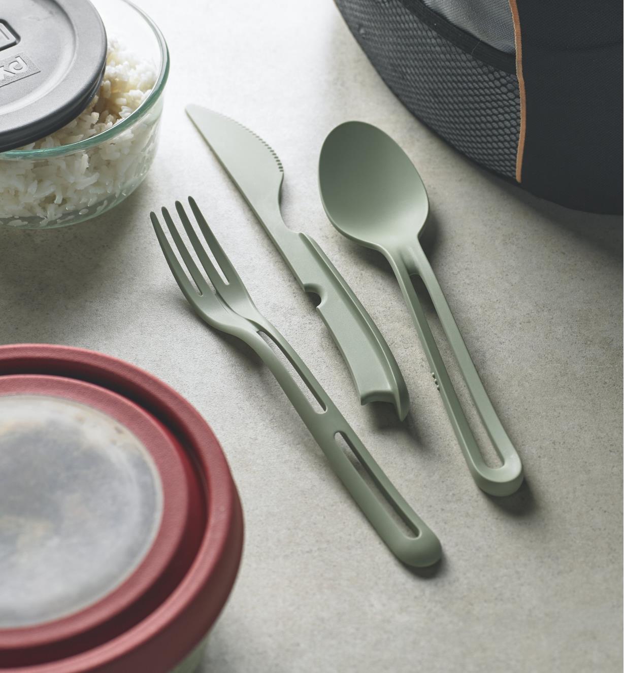 Klikk utensils set out on a table, ready to use