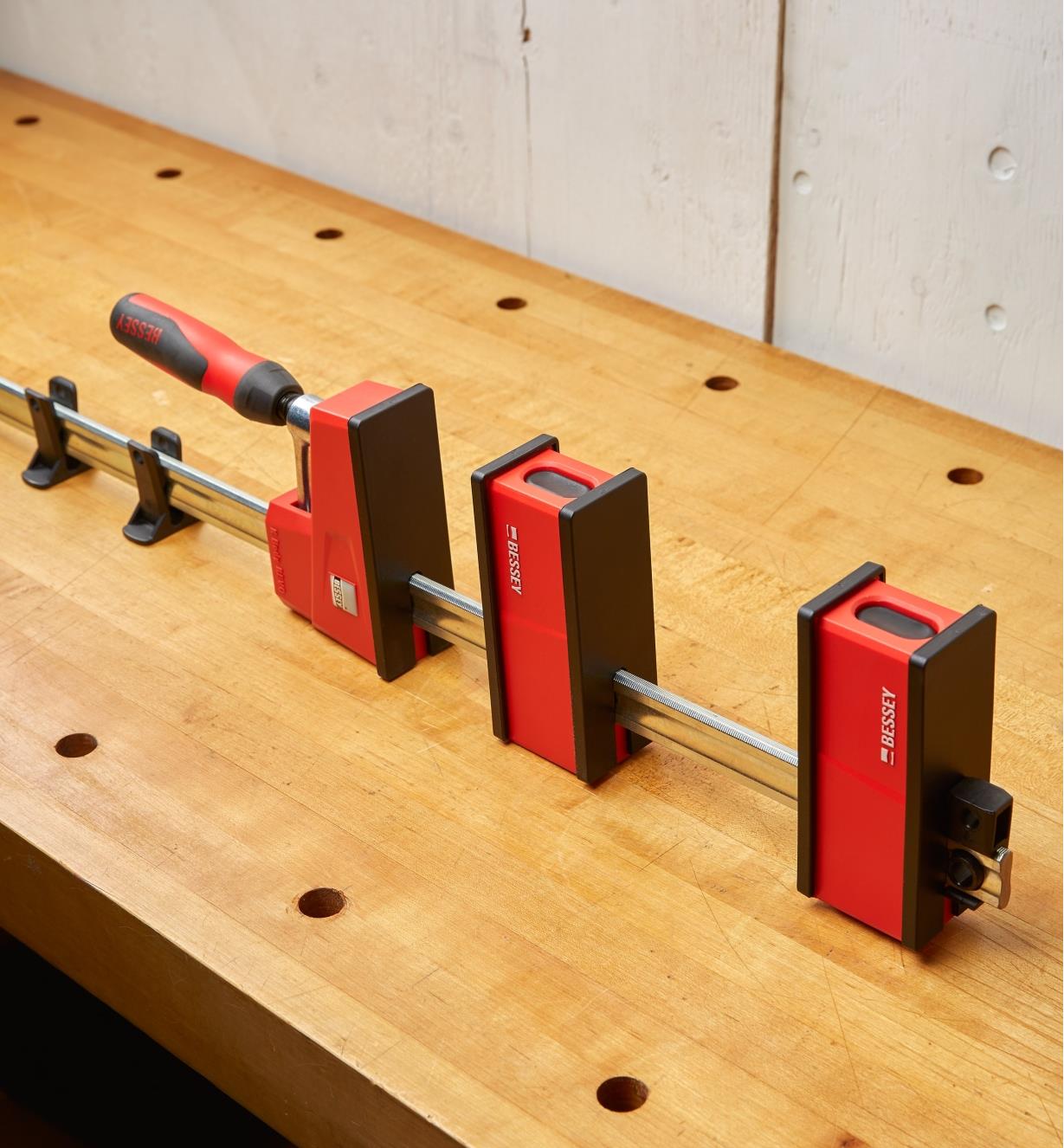 A Bessey clamp with the variable jaw positioned on its rail