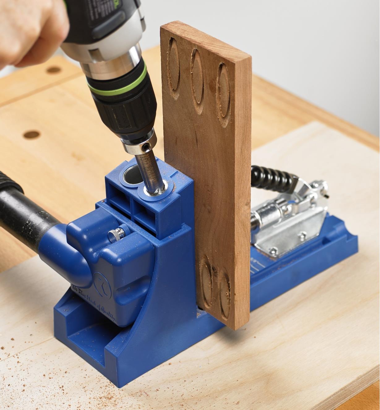 Using a drill to make pocket-hole plugs from a board