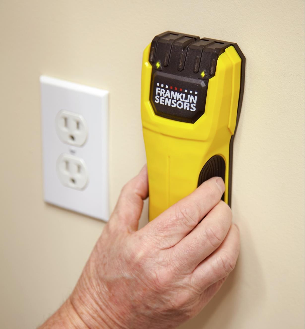 The Franklin M50 stud detector detects the presence of live electrical wires behind a wall