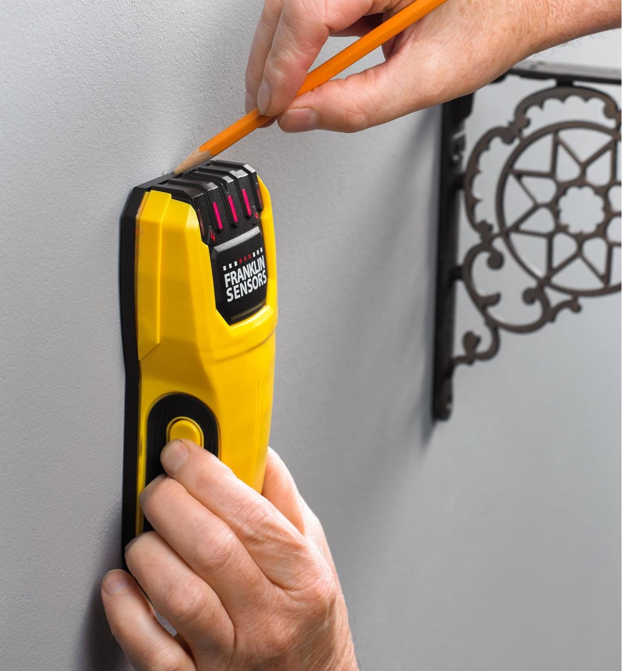 Using the Franklin M50 stud detector to locate studs for installing a wall shelf in the home