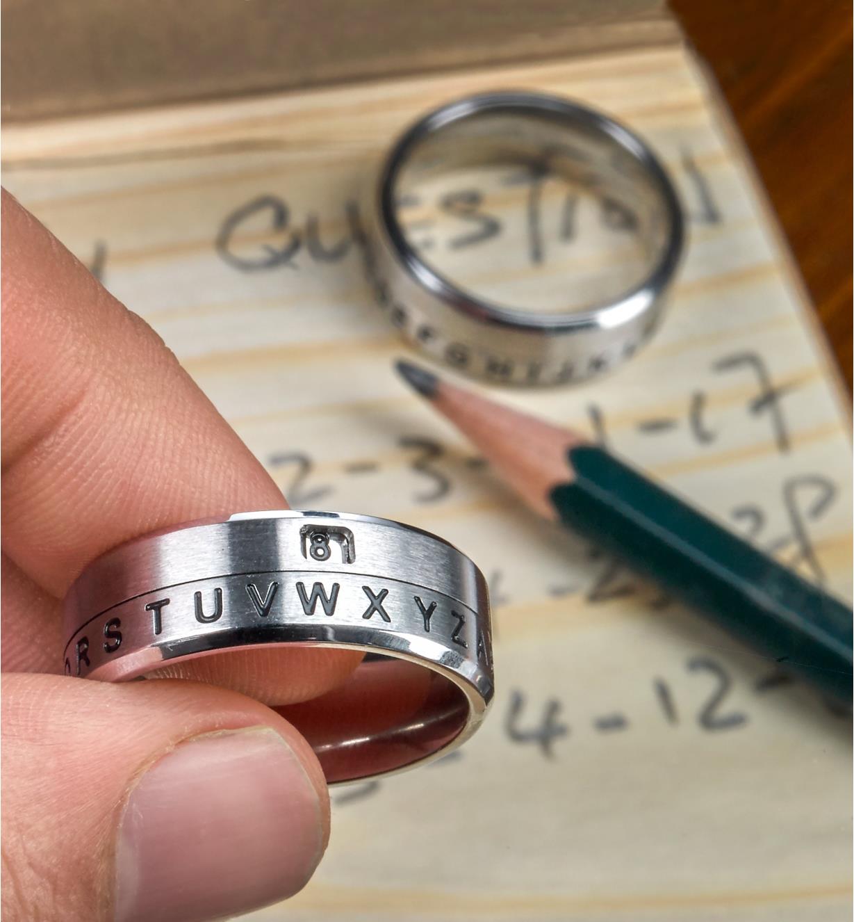 A secret decoder ring being used to encrypt a secret message
