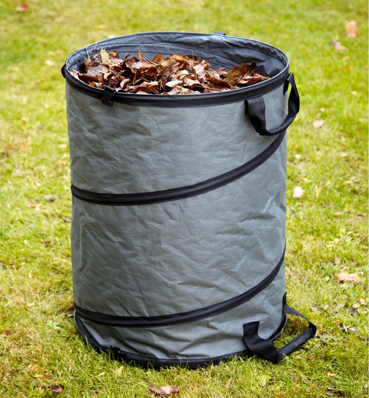 Hard-bottom pop-up tote filled with yard waste