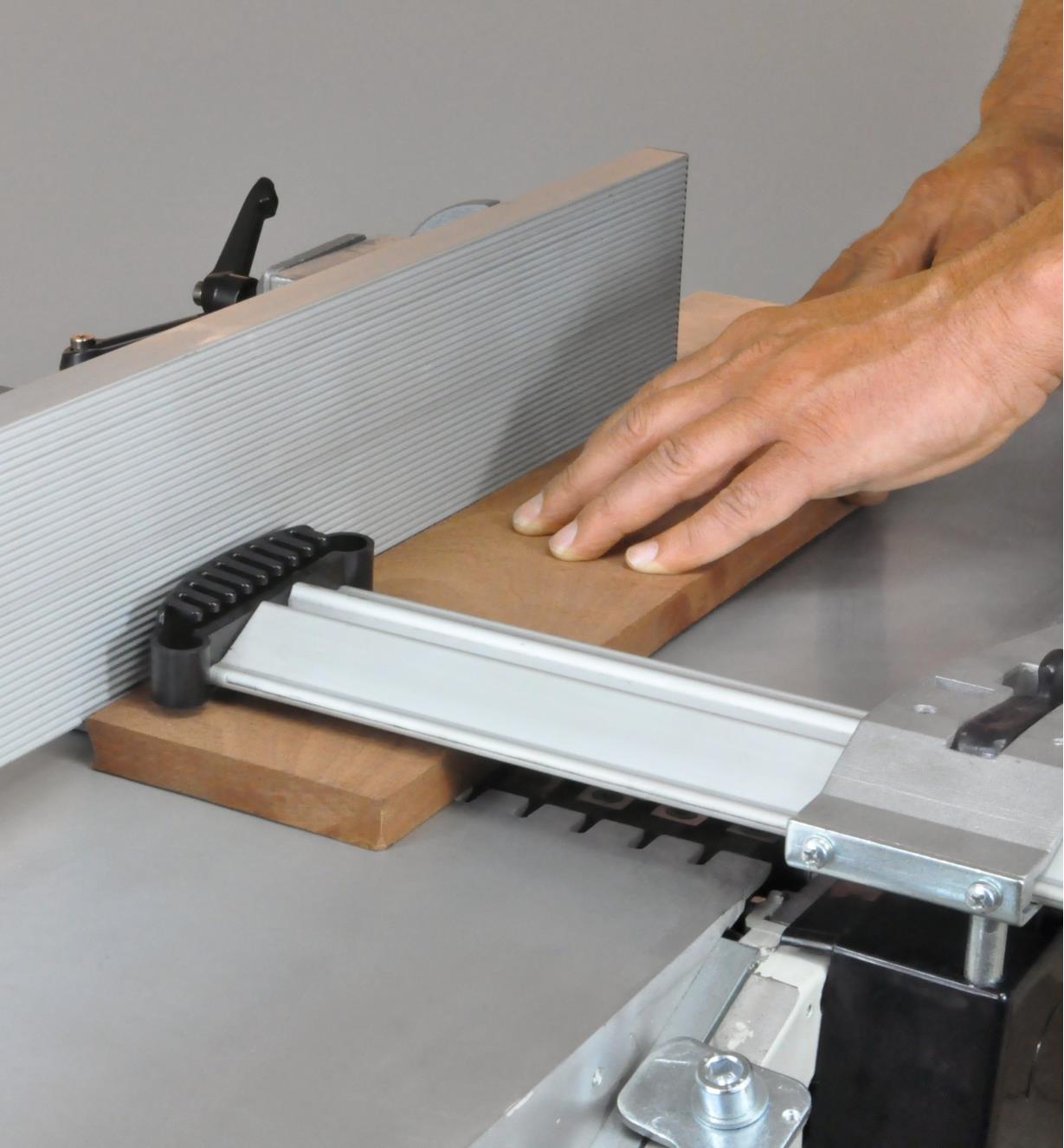The blade guard on the Rikon 10" helical planer/jointer helping to protect the user from injury