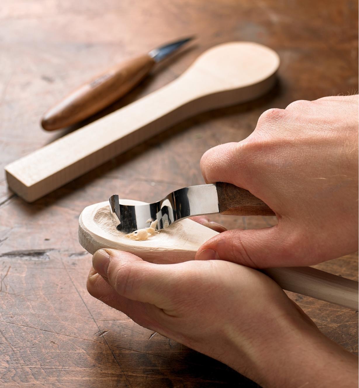 Hollowing the bowl of a wooden spoon with the hook knife