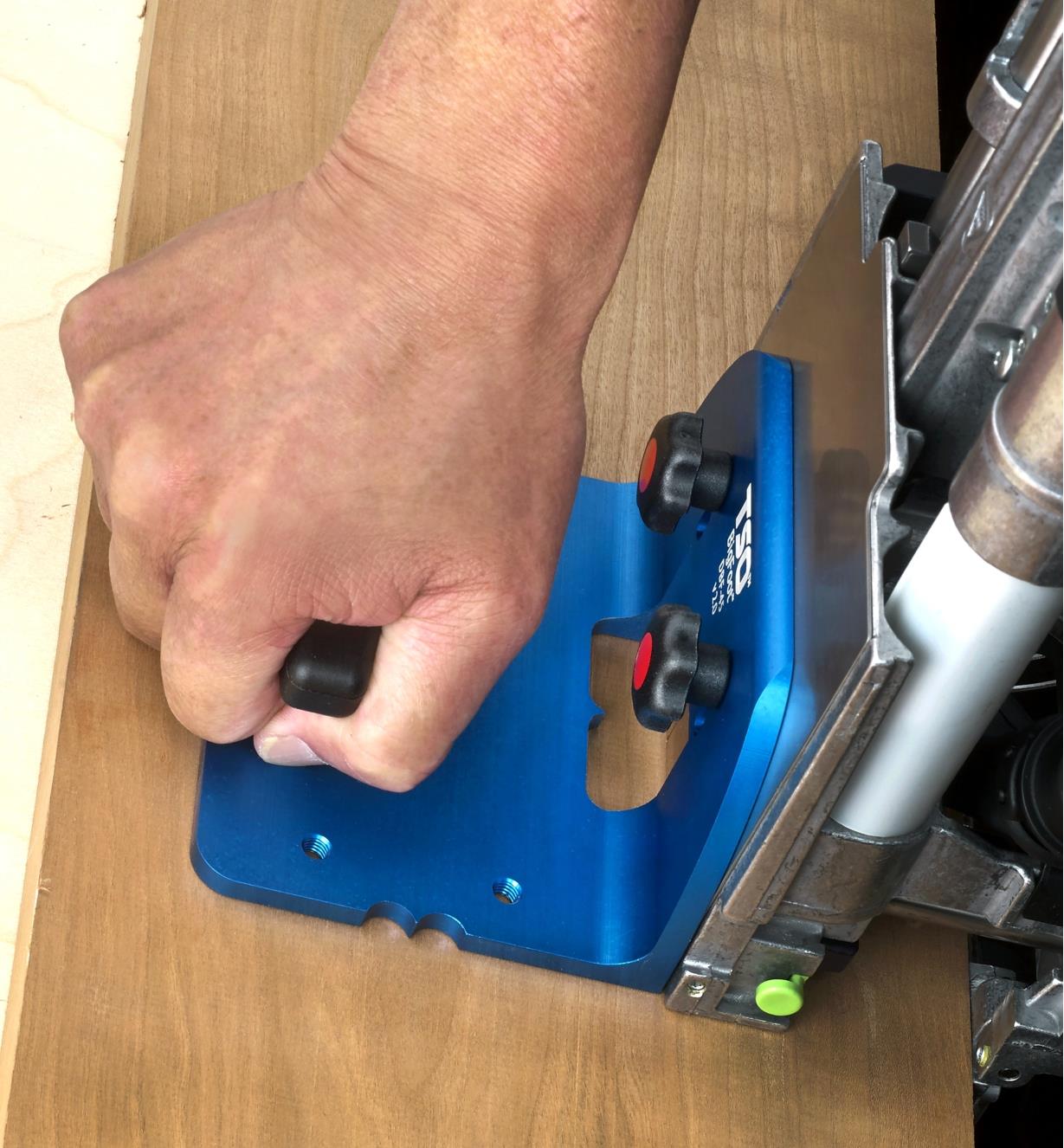 A BigFoot base support bracket mounted on a Domino joiner for vertical mortising