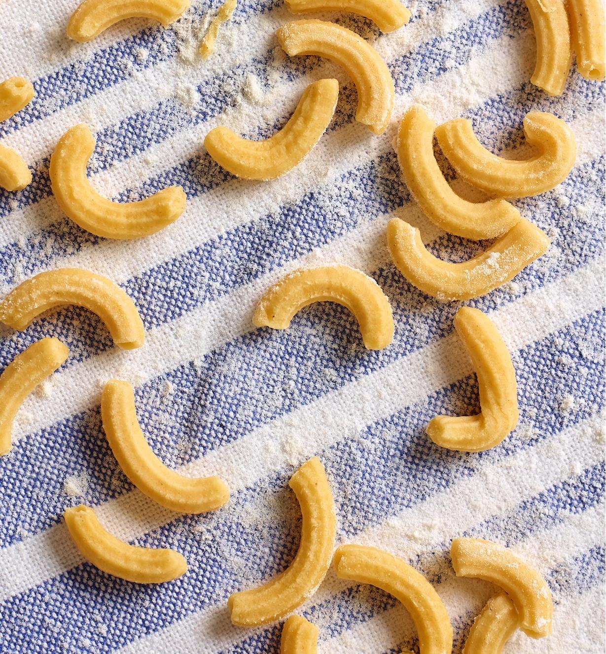Fresh macaroni noodles made with the Marcato Pasta Extruder