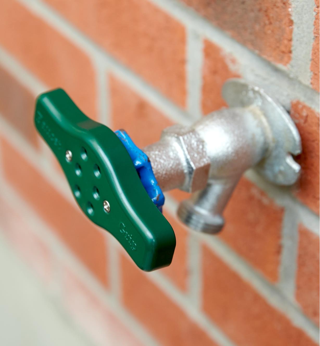 Faucet Grip installed on an outdoor faucet