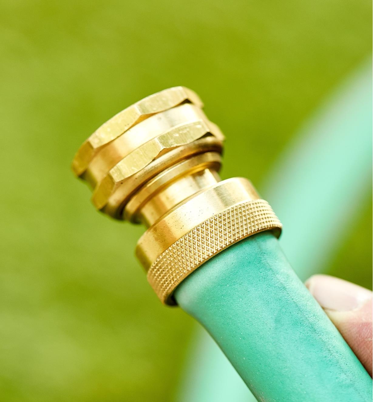 The female brass hose coupler installed on a hose end