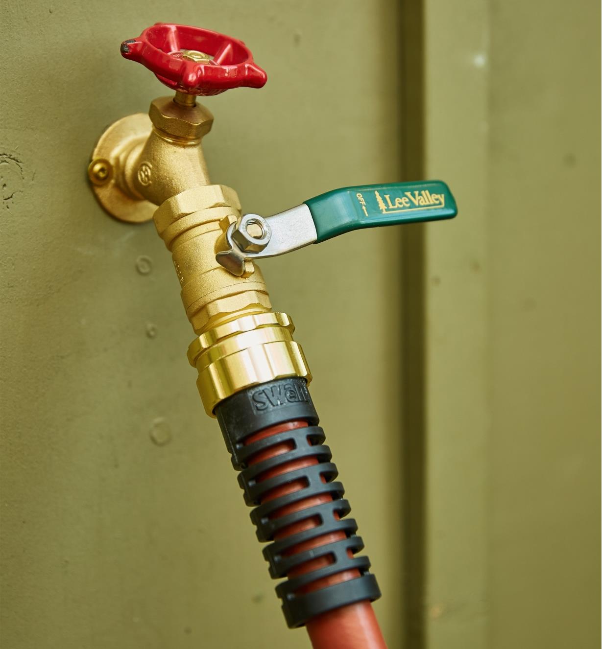 Straight Shut-Off Valve connected between an outdoor faucet and garden hose