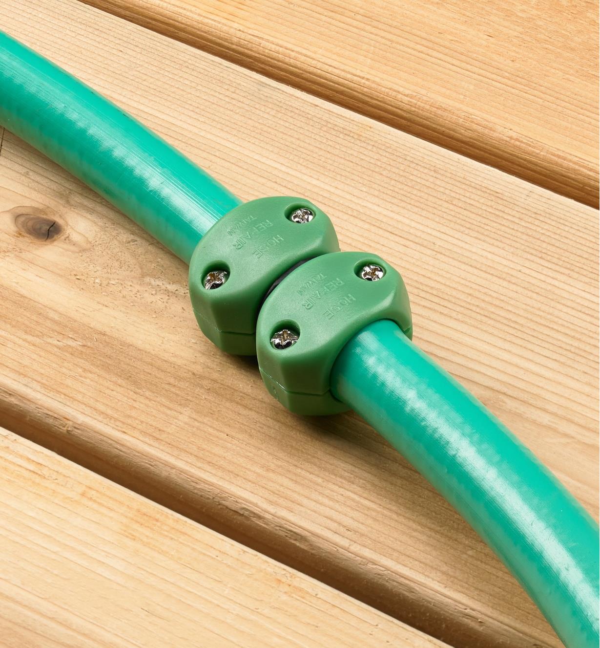The hose mender used to link two sections of garden hose