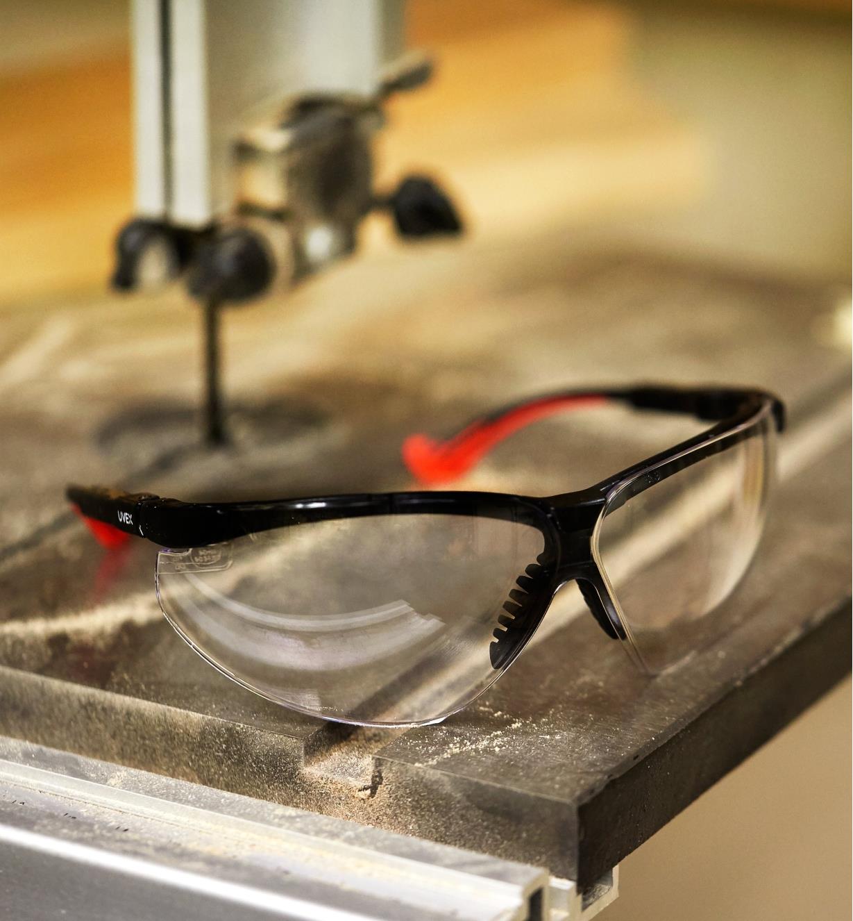 Professional Safety Glasses sitting on a bandsaw table