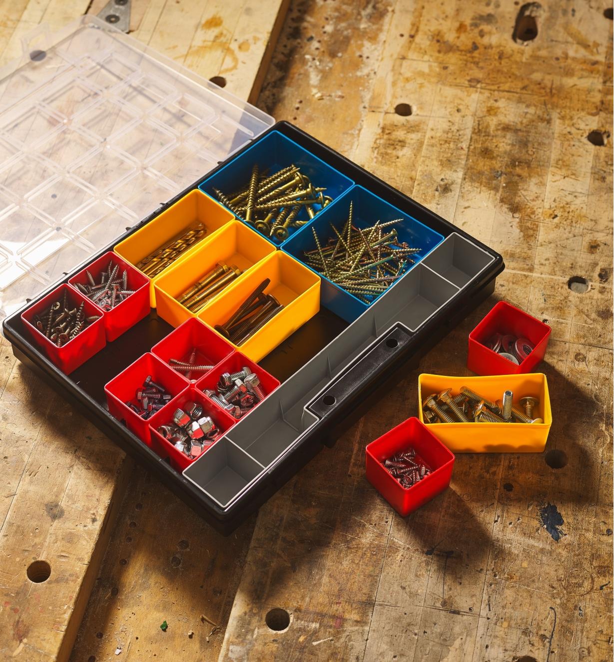 Various fasteners fill the removable bins from the Allit economy modular storage case