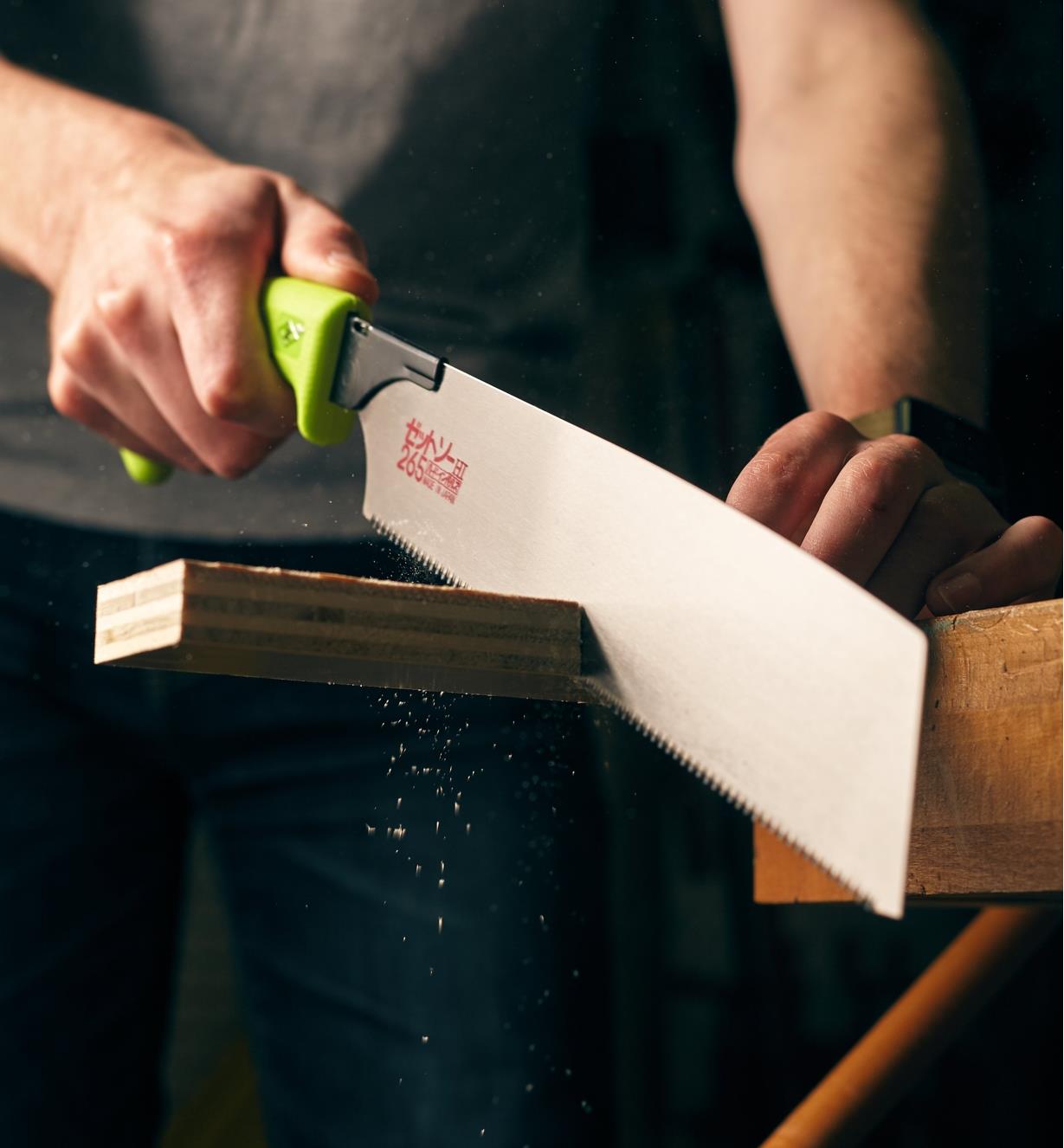 Cutting through plywood using a Japanese rip/crosscut saw