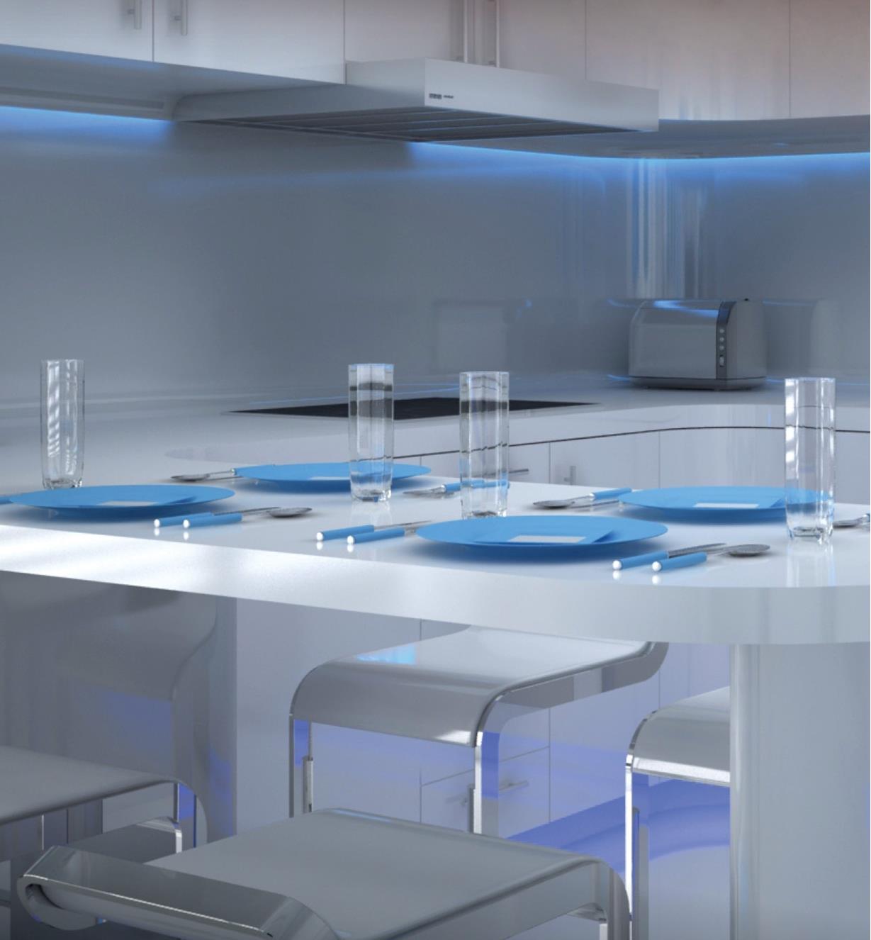 A kitchen with blue lighting under the upper cabinets