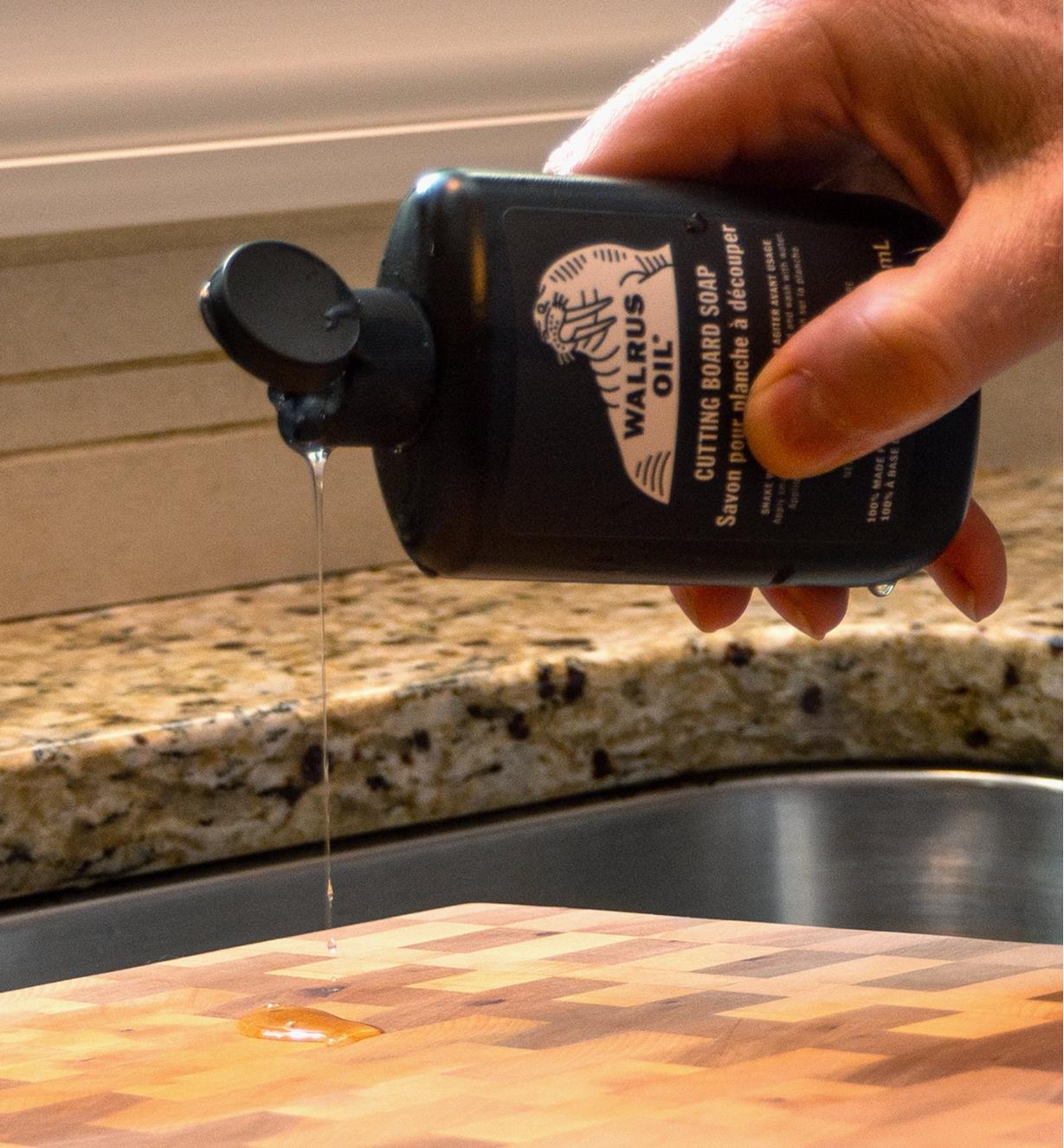 Applying Walrus Oil cutting board soap to a wooden cutting board
