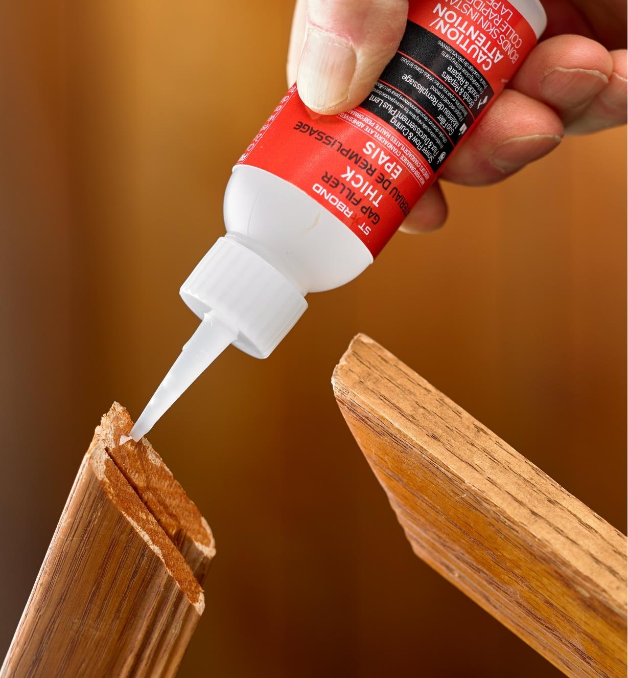 Applying Starbond thick CA glue to the miters of a picture frame