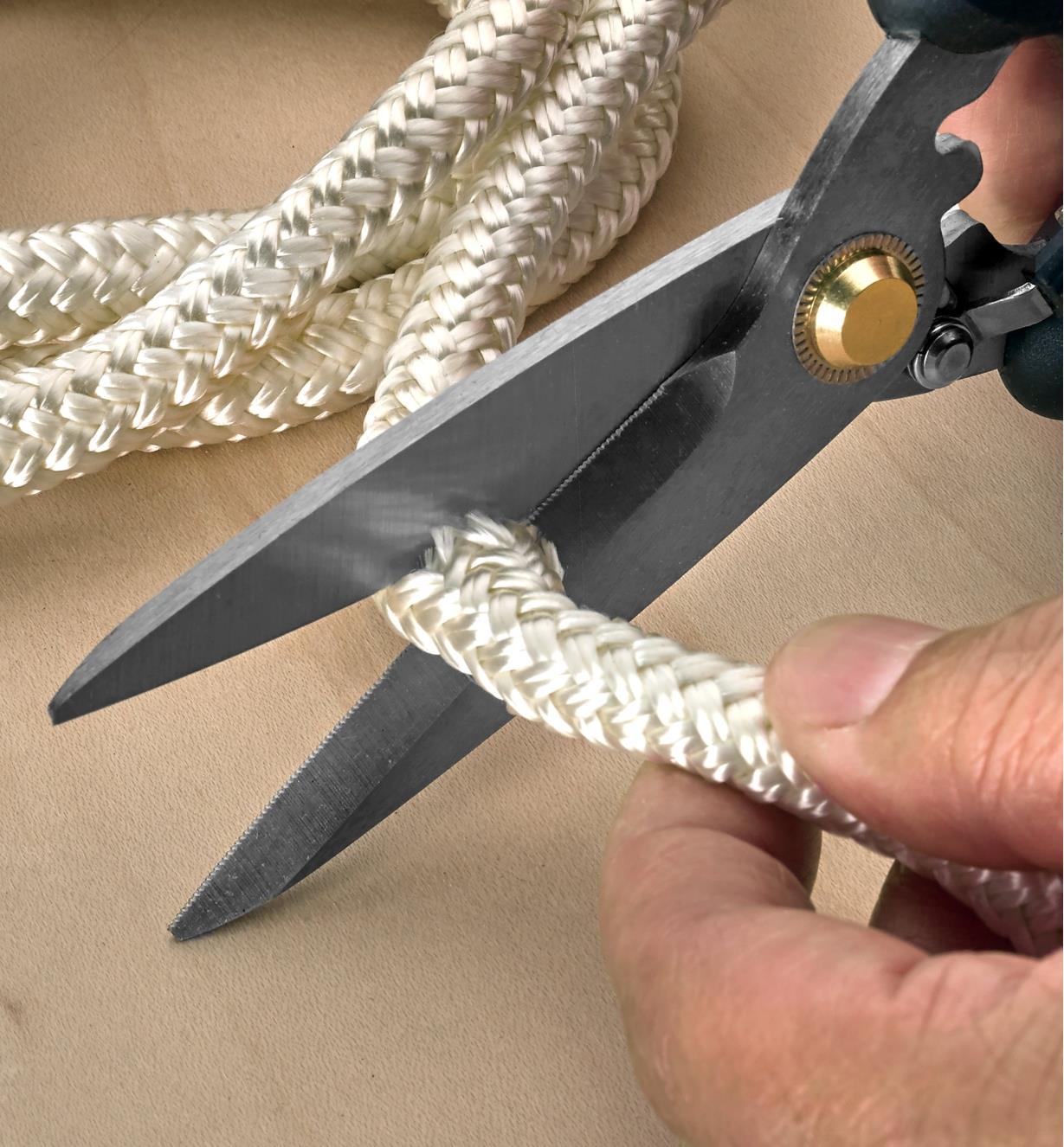 Using the shears to cut braided nylon rope