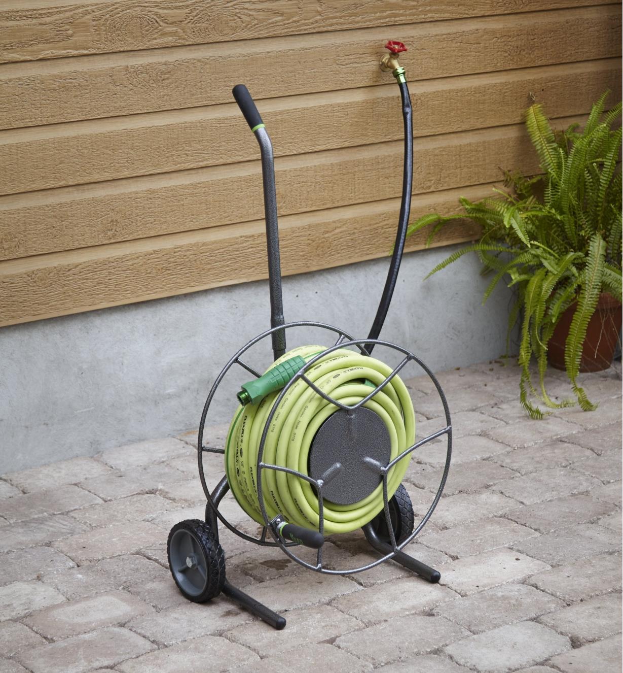 Compact Hose-Reel Cart holding a hose on a patio