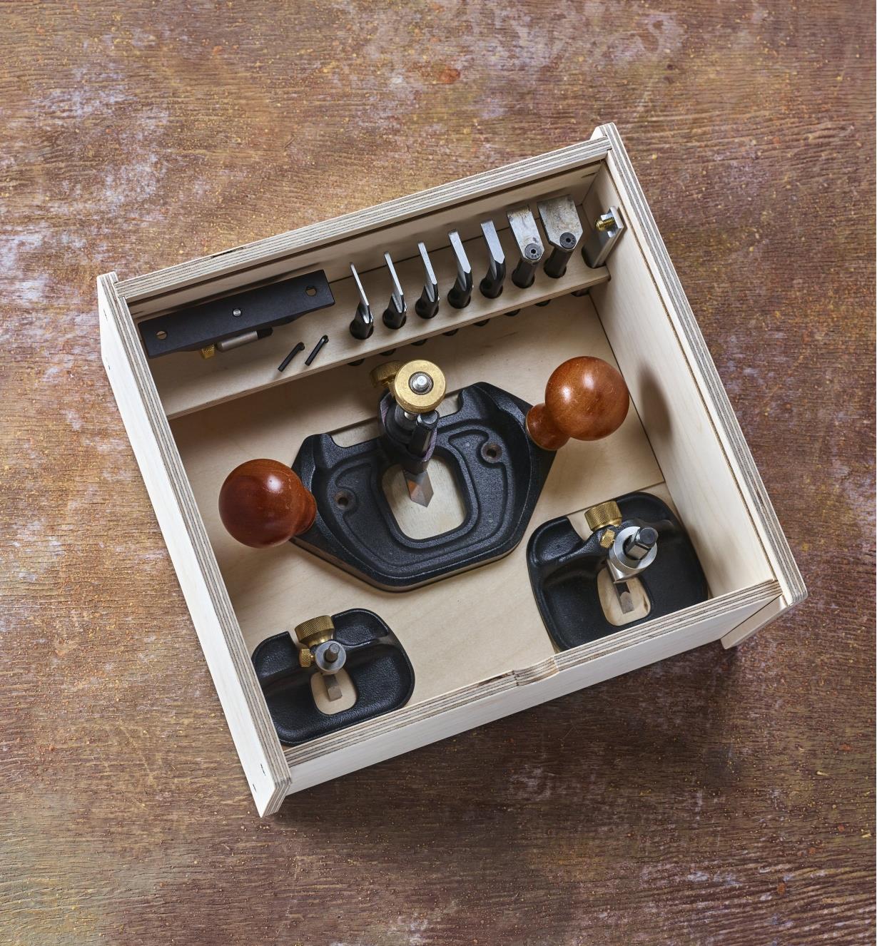 Veritas small, medium and large router planes and accessories stored in a Veritas router plane box