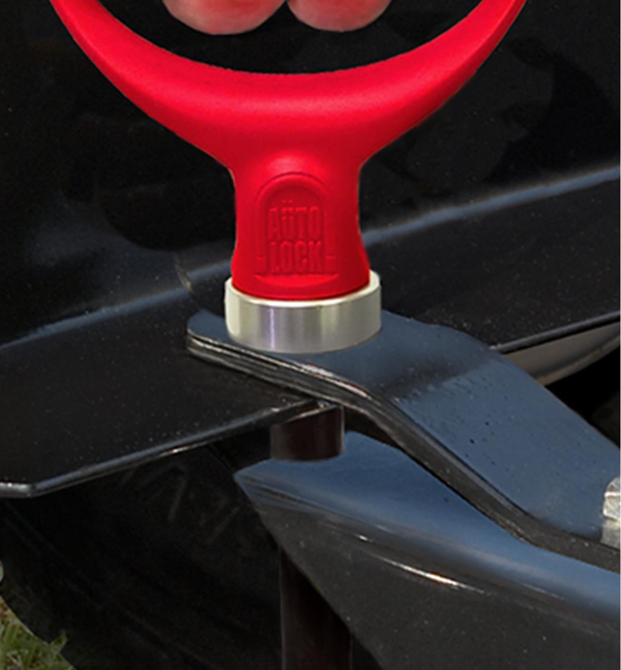 Close-up view of the magnet holding the magnetic hitch pin in the hitch