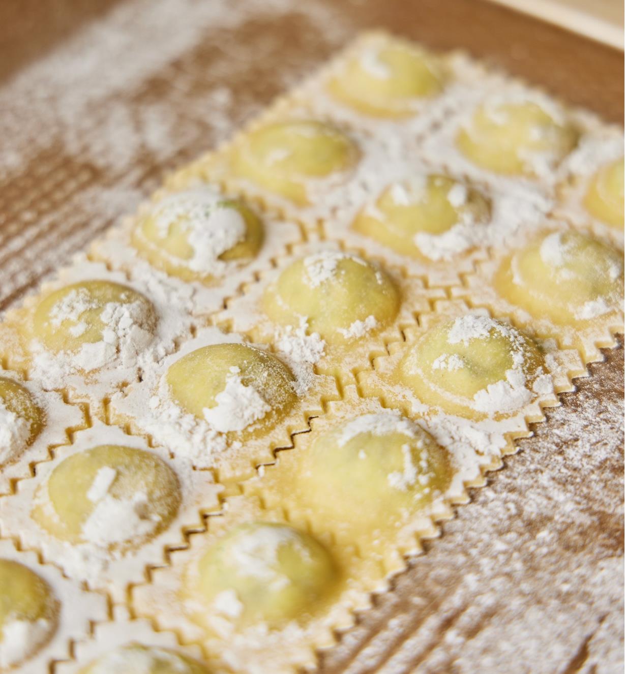 Close-up view of ravioli pieces released from the mold