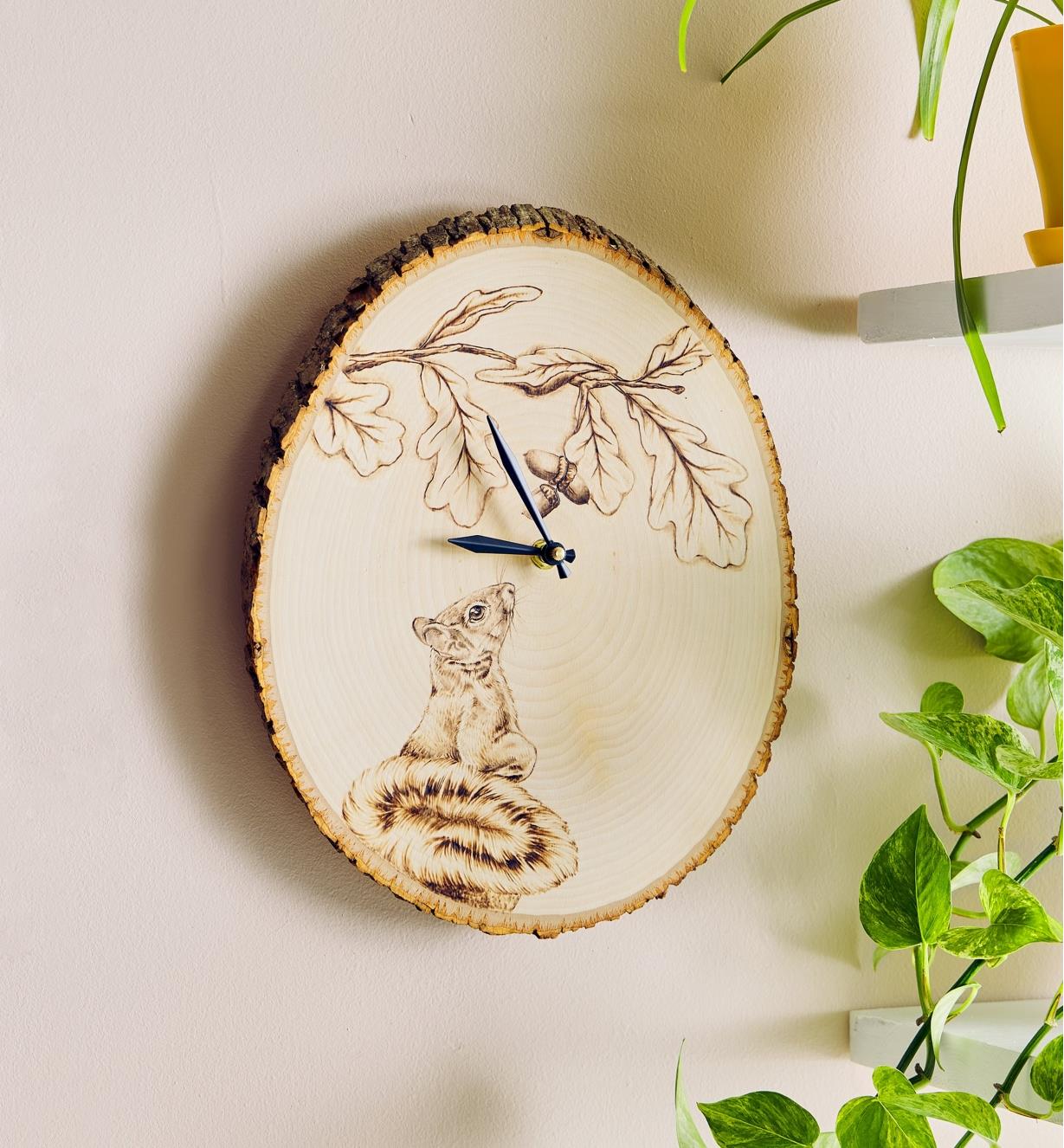 The completed pyrography clock project on display