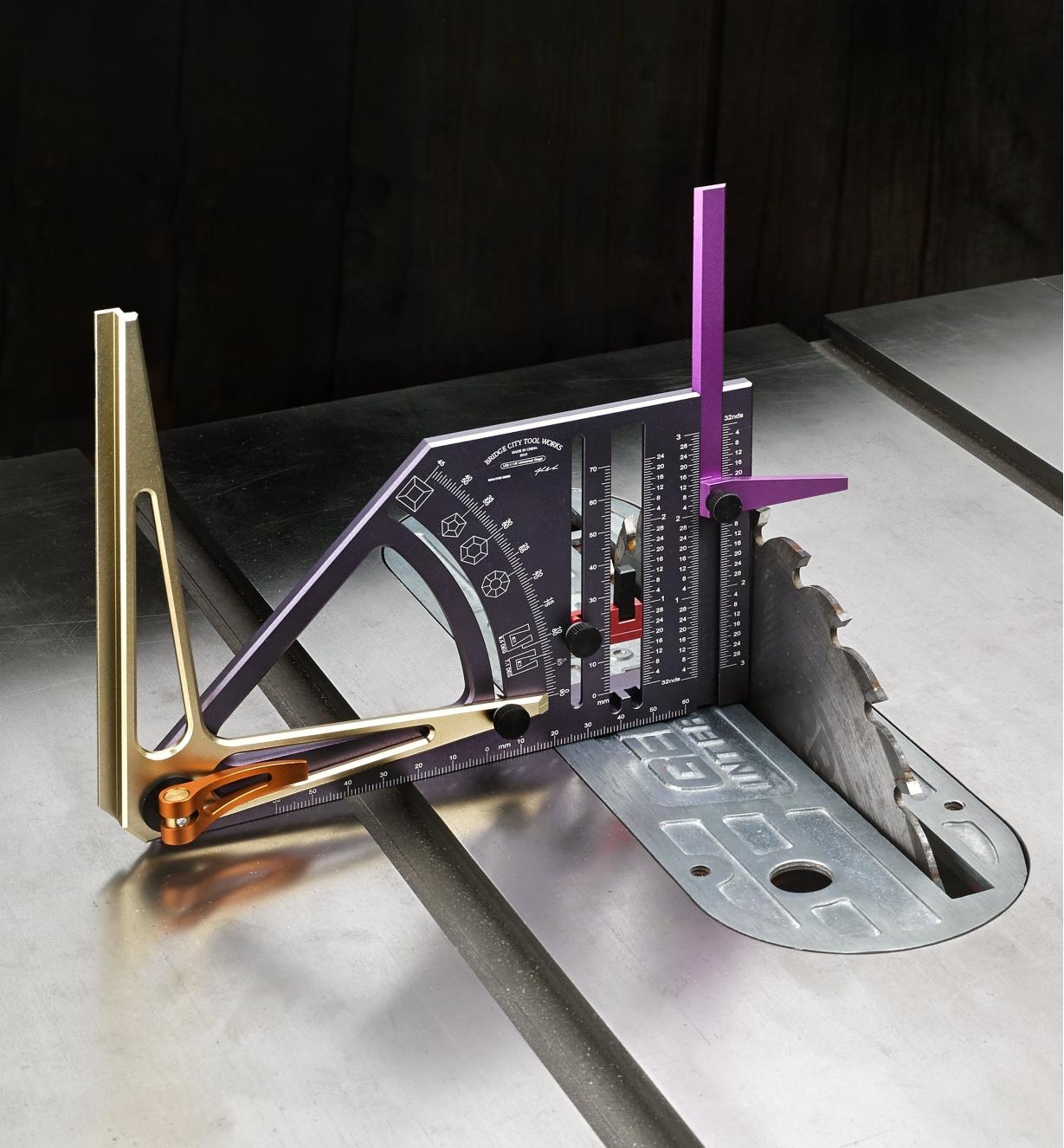 A Bridge City right-hand universal gauge being used to check the height of a table-saw blade