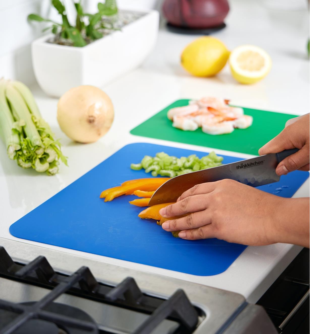 Chopping food items on a flexible cutting mat