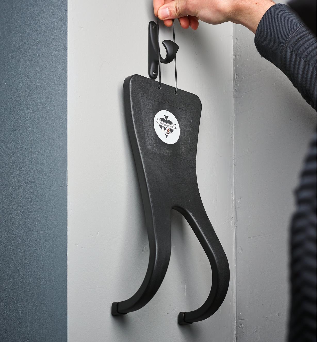 Hanging a black jack boot jack from a wall hook