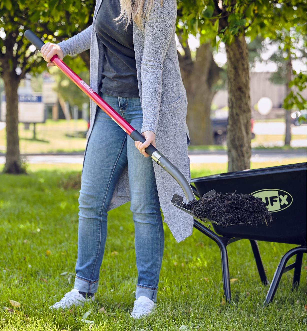 Transferring mulch from a yard cart using the long-handled square shovel