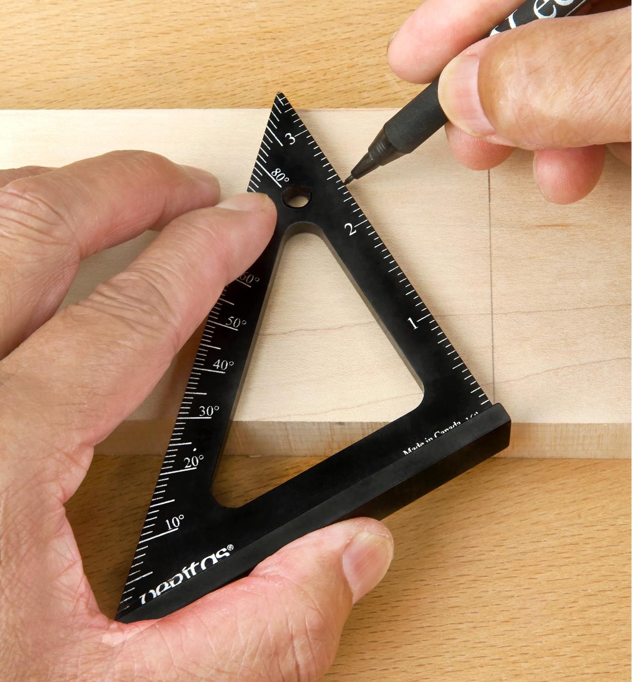 Using the protractor scale marked on a 3 1/2"" Pocket Layout Square to lay out a 30° cut line