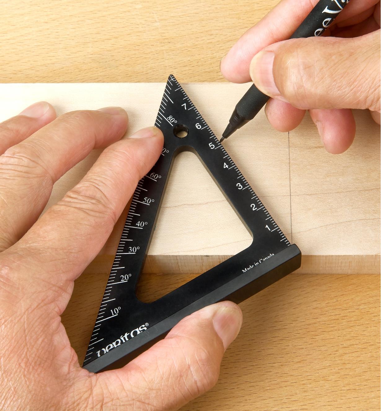Using the protractor scale marked on a Veritas 85mm Pocket Layout Square to lay out a 30° cut line