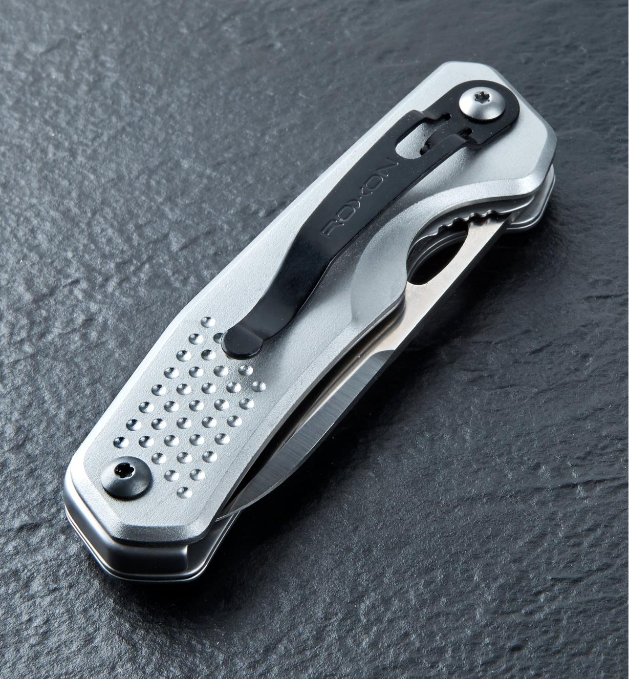 The 3-in-1 knife shown with the drop-point blade folded in the closed position