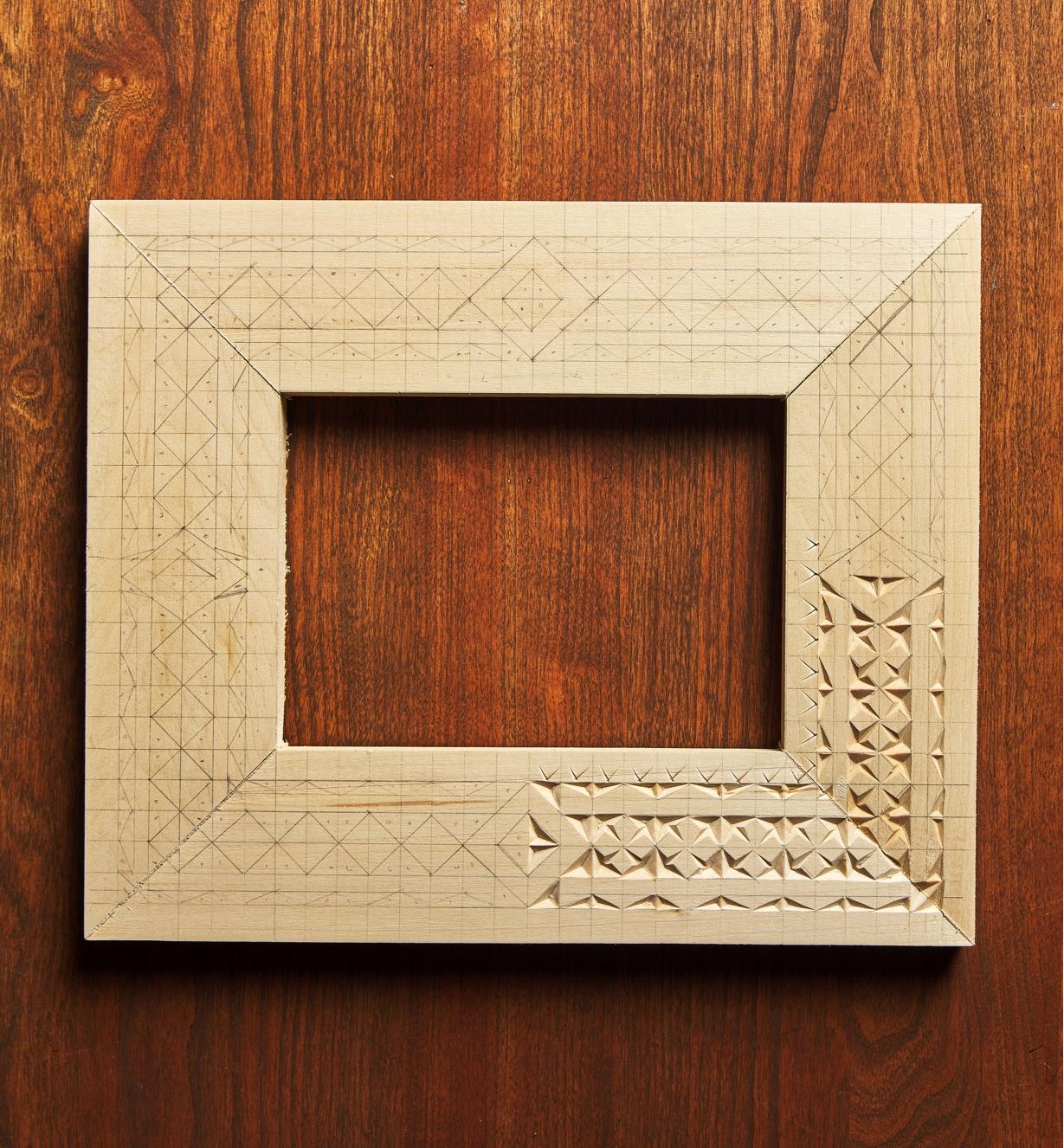 A partially completed chip carved frame