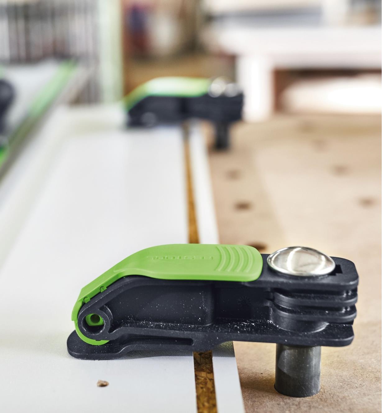 Two Festool Quick Clamps MFT-HZ 80 holding a board on an MFT table