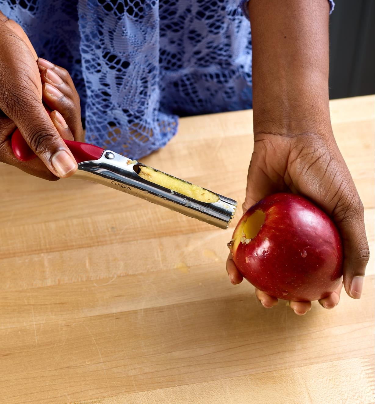 Removing the core from an apple using the apple corer