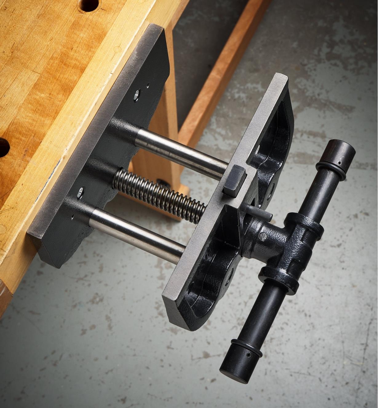A top view of a Jorgensen quick-release bench vise installed on a workbench