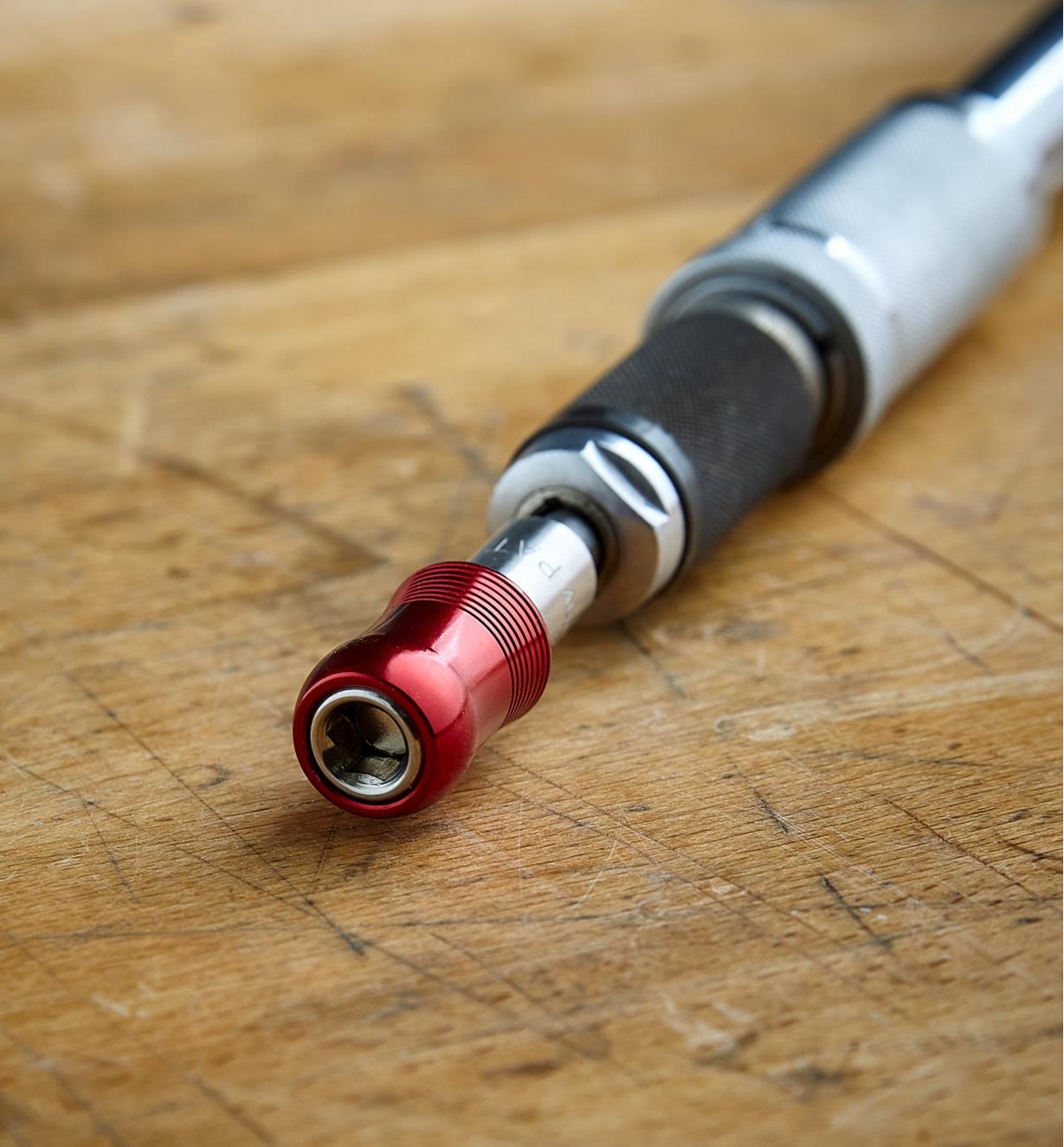 A hex adapter attached to the end of a Yankee-style screwdriver