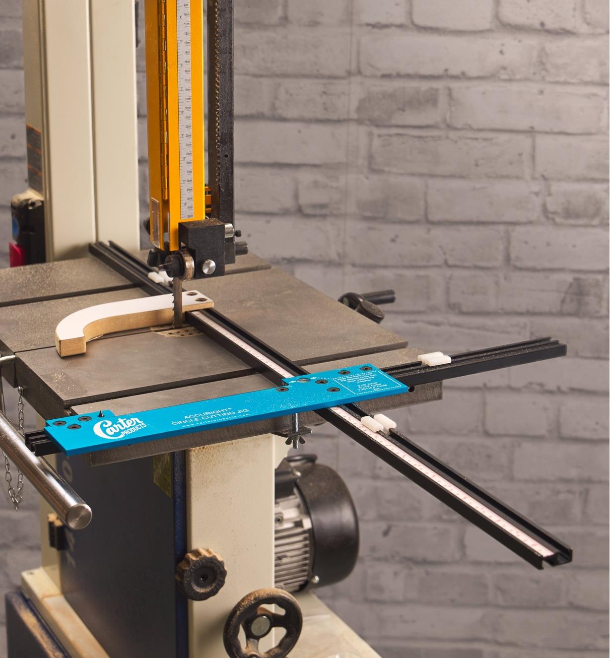 A circle-cutting jig and support connected to a bandsaw