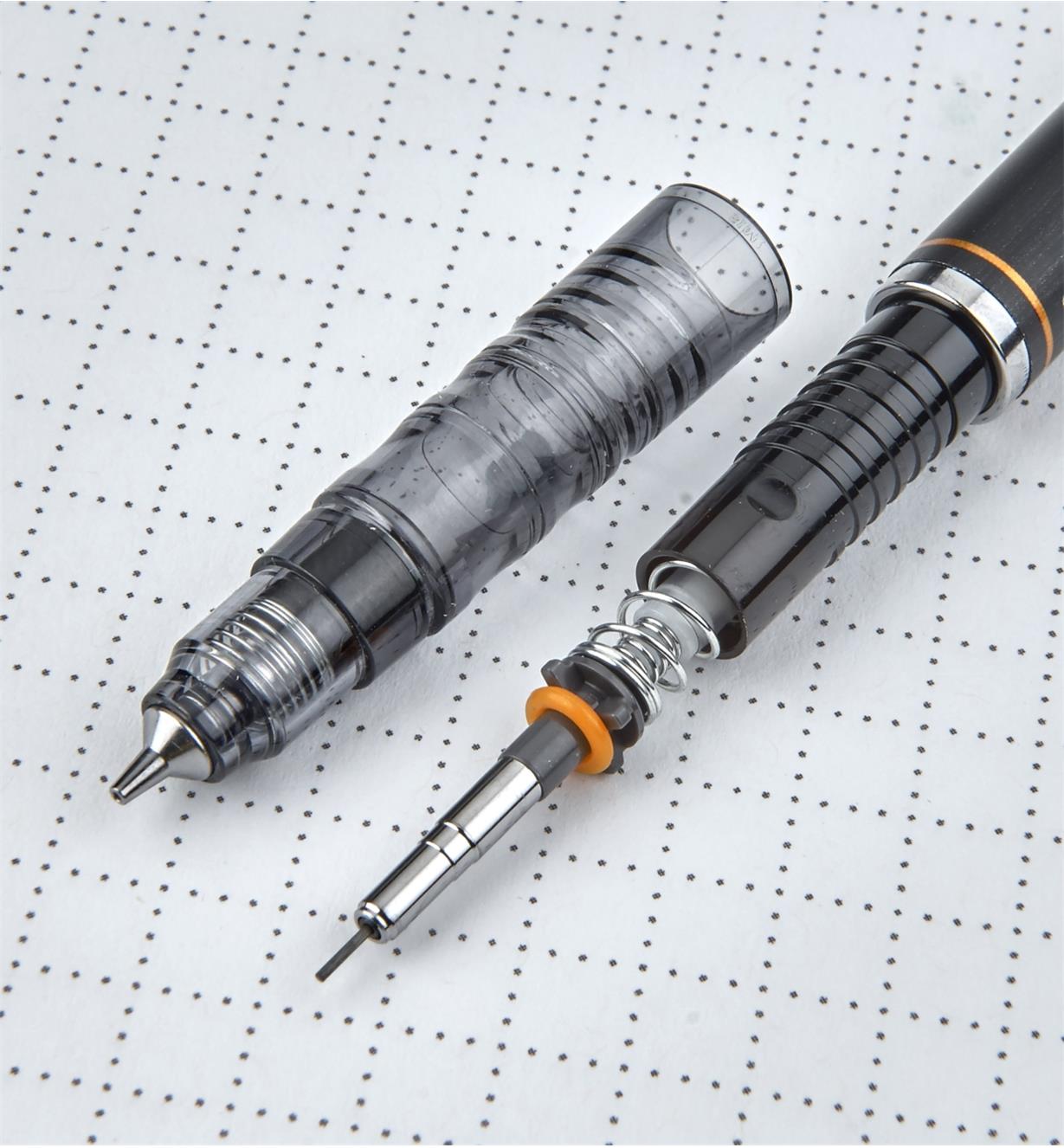 Mechanical pencil with part of the housing removed to show the lead-advancement mechanism