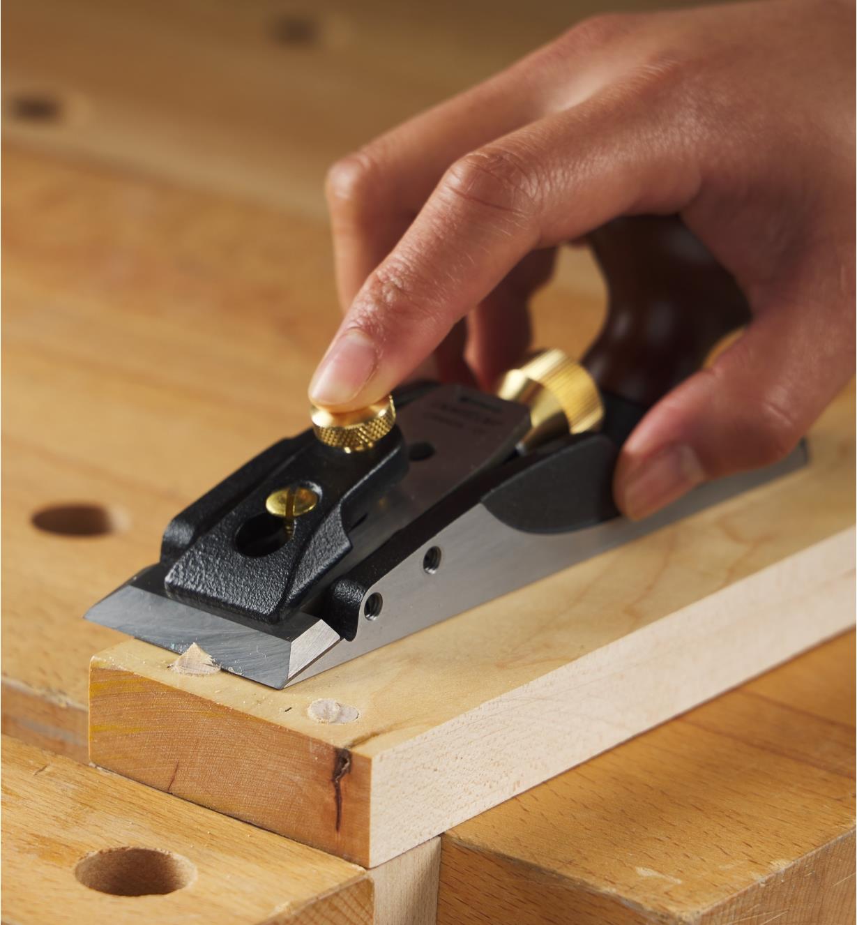 Trimming plugs on a board using the cabinetmaker’s trimming plane