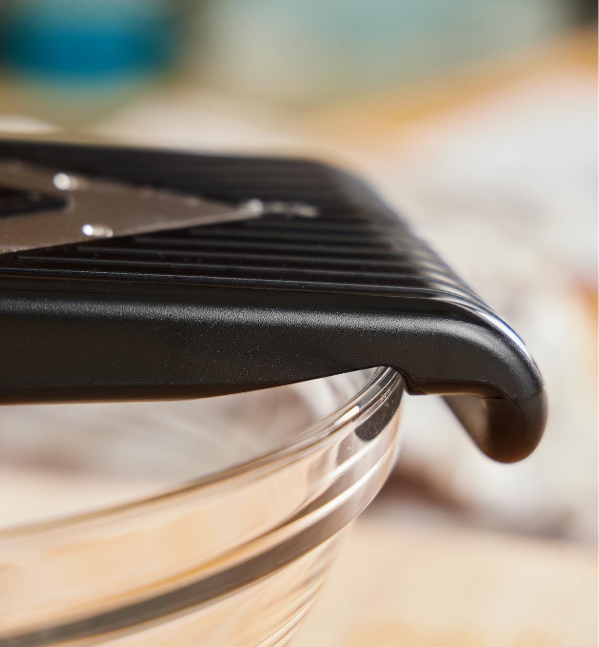Close-up view of a bowl hook on the V-slicer