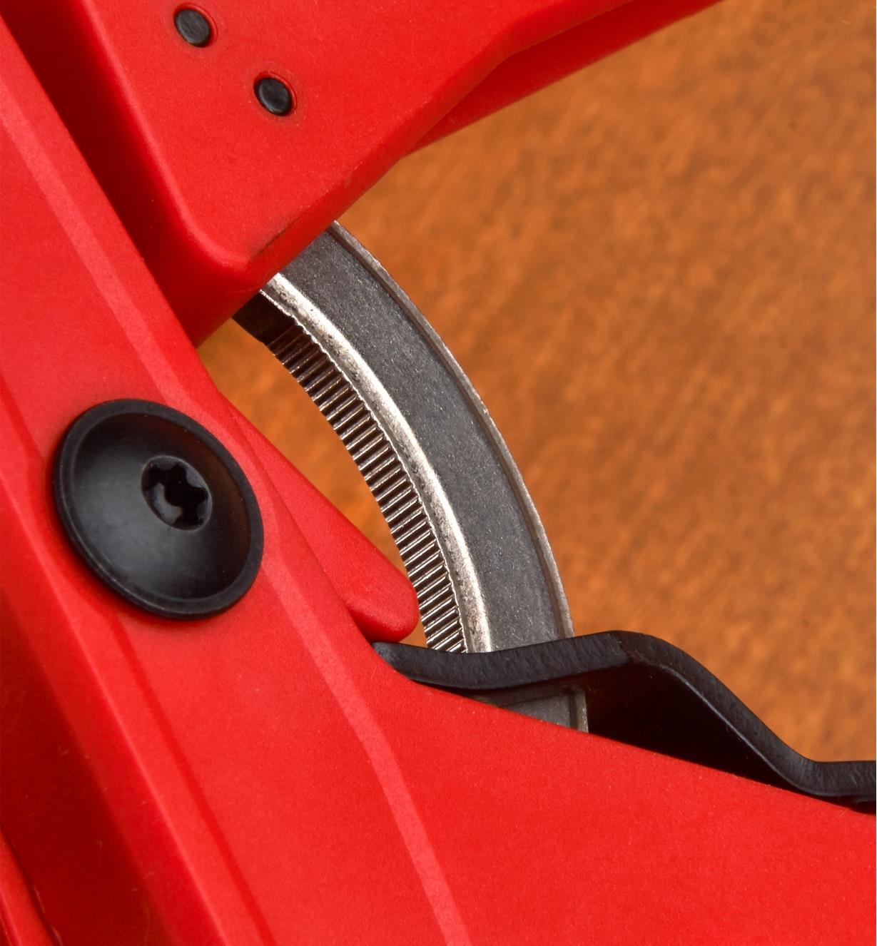 A close-up view of the steel lock-up/quick-release mechanism on a ratcheting clamp