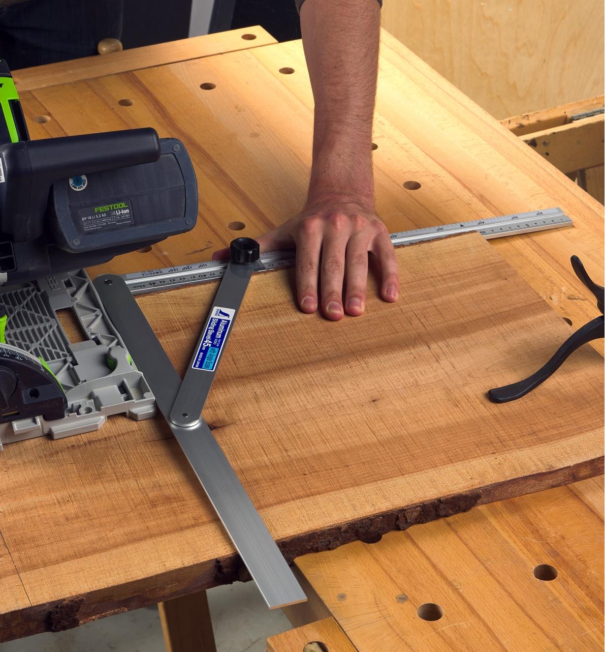 Using a large aluminum bevel as a cutting guide for a circular saw