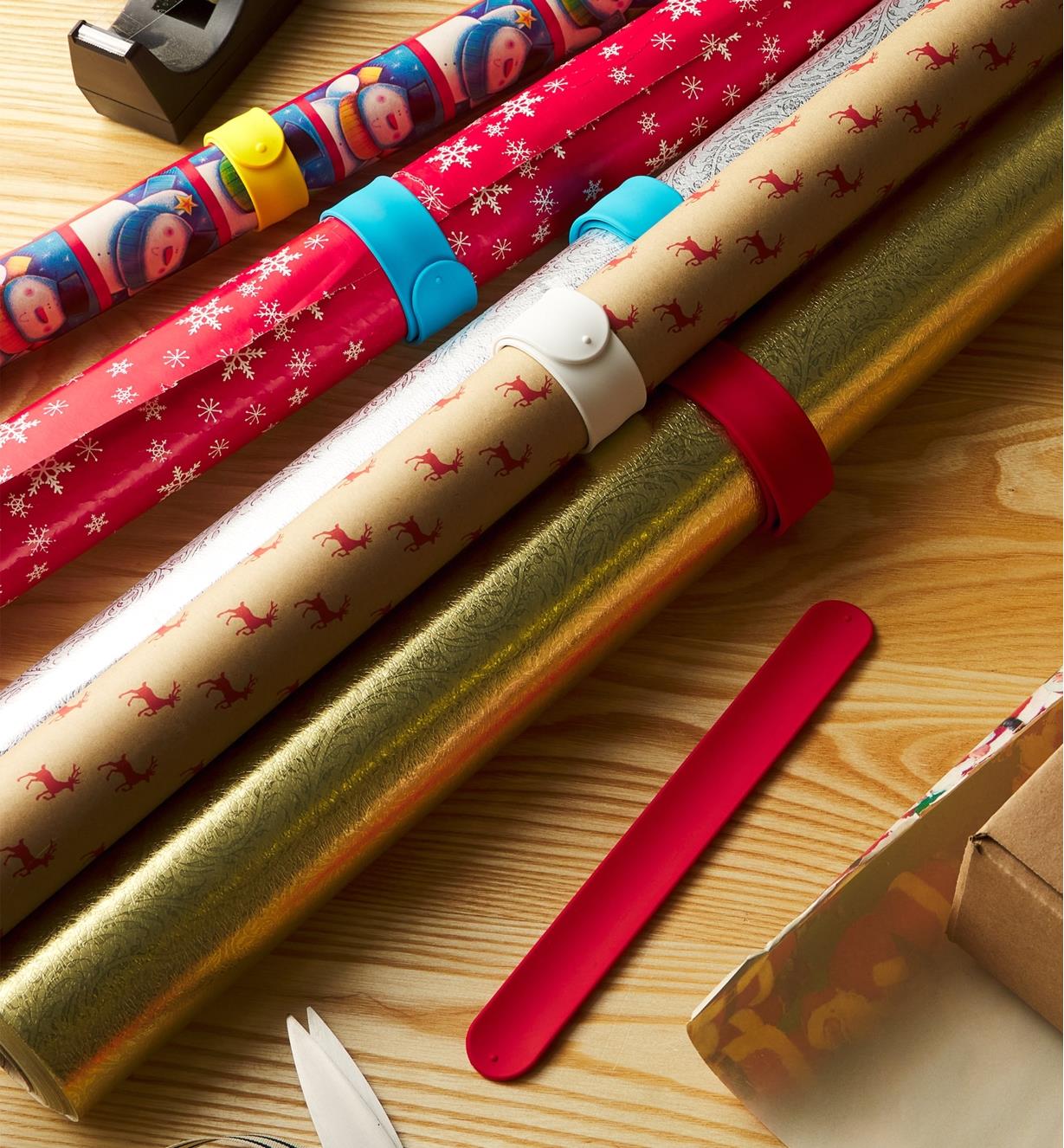 Slap bands used to keep rolls of wrapping paper neatly bundled