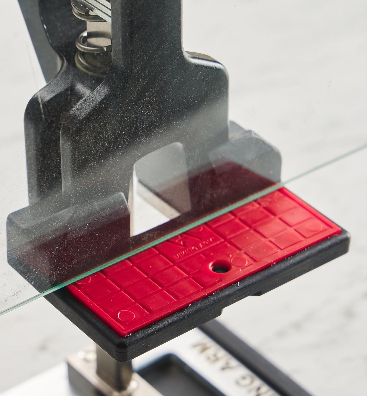 A Viking Arm assembly jack being used with the base plate and lift bar pads to raise a pane of glass