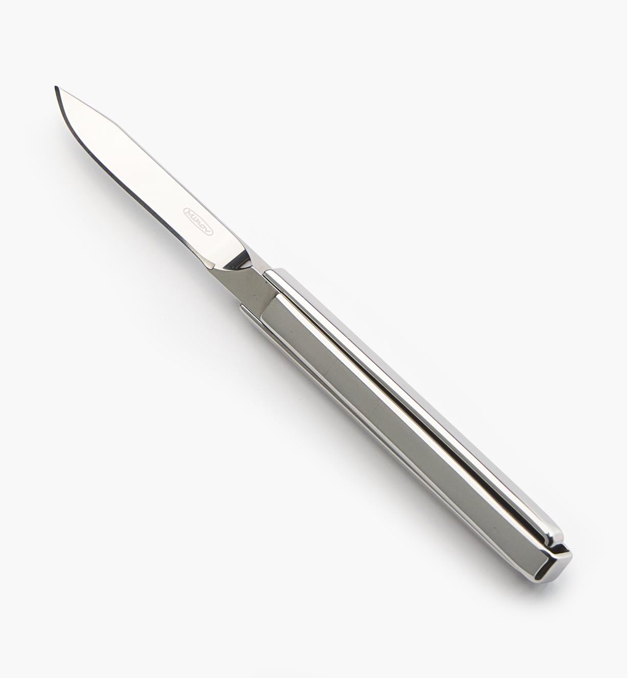 09A0600 - Couteau à lame dissimulable