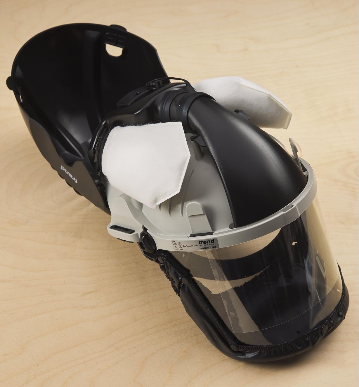 Dual dust filters inside an open helmet